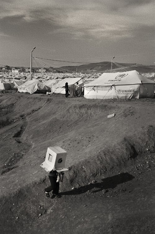 A Child Plays In Kawergosh Refugee Camp 599X907 